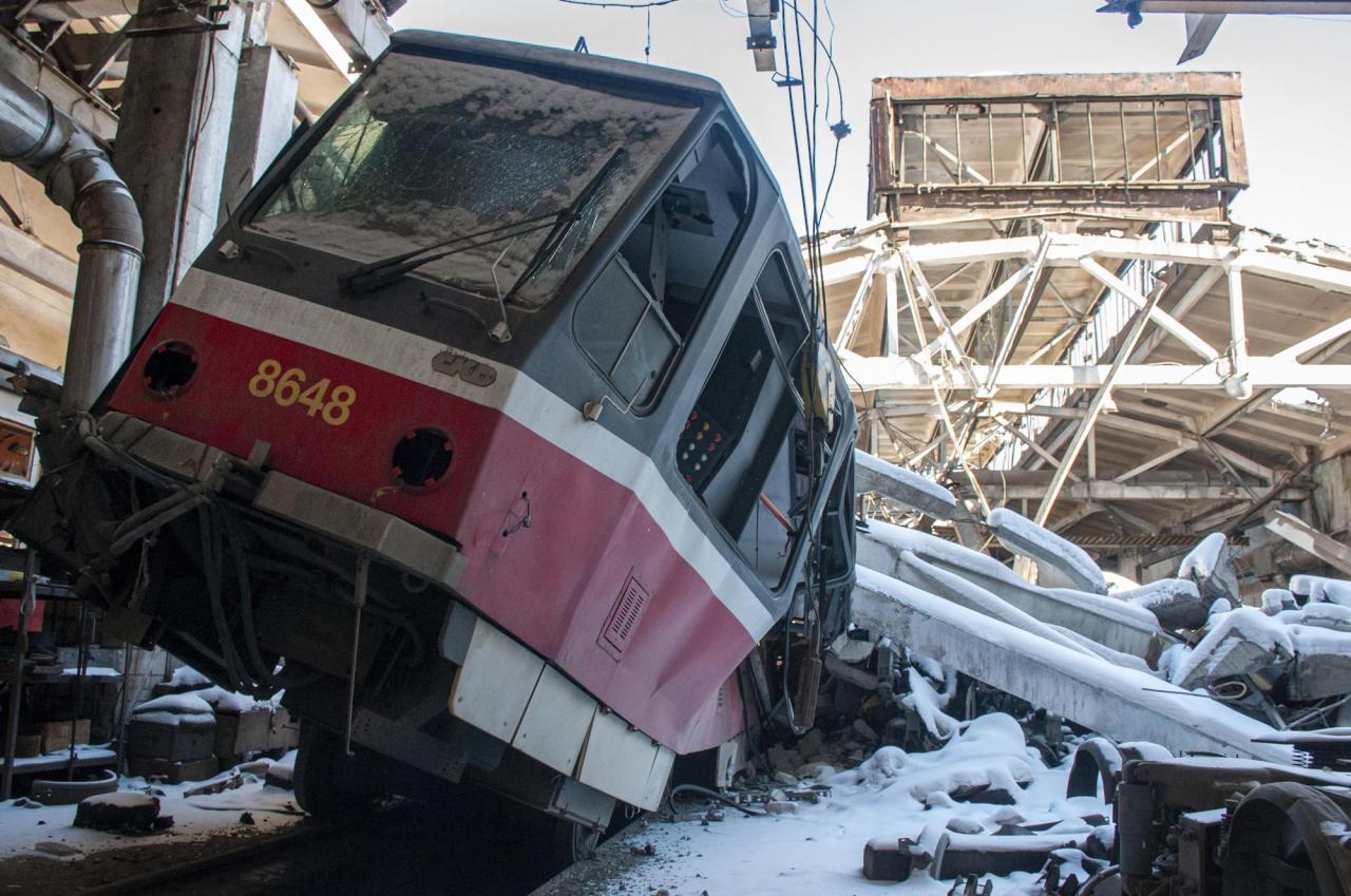 A tram damaged by shelling sits at a tram depot, in Kharkiv, Ukraine, Saturday, March 12, 2022. (AP Photo/Andrew Marienko)