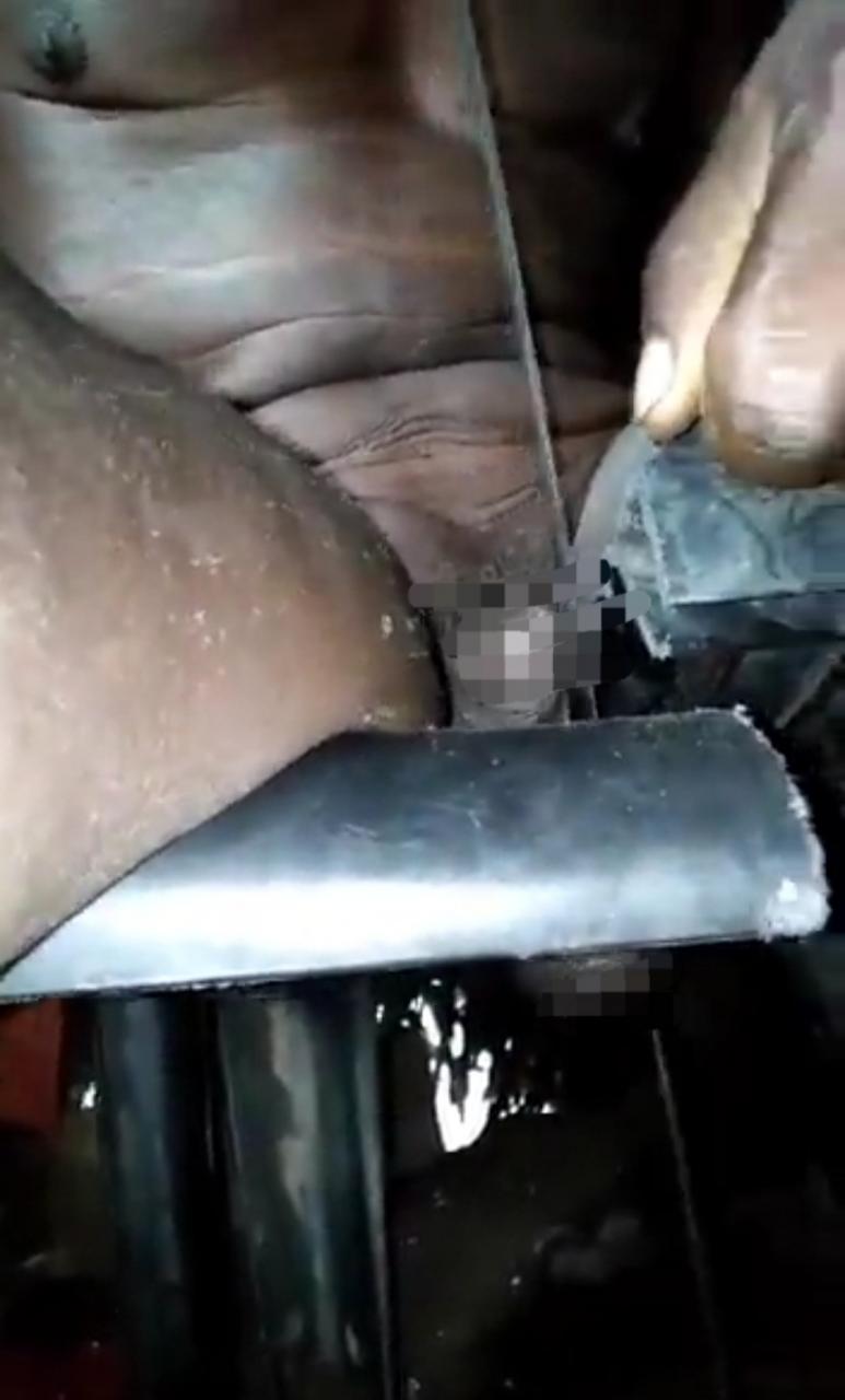Nak3d man gets his scrotum stuck inside tiny opening of a plastic chair (video)