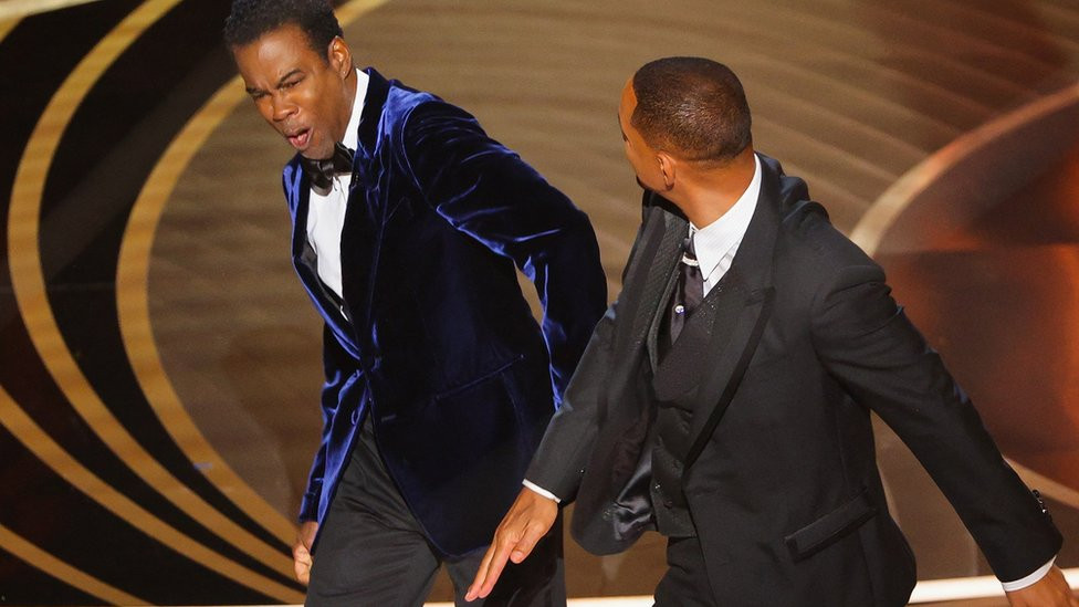 Twitter users dig up old video of Will Smith making a joke about a bald man after he slapped Chris Rock for putting up similar joke about his wife (Watch)
