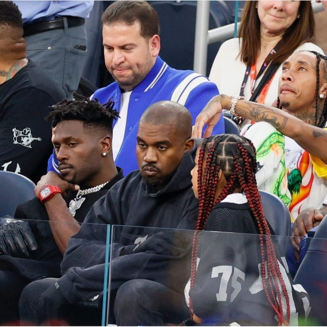 Kanye West seen at the Super Bowl with his two eldest kids (photos/video)