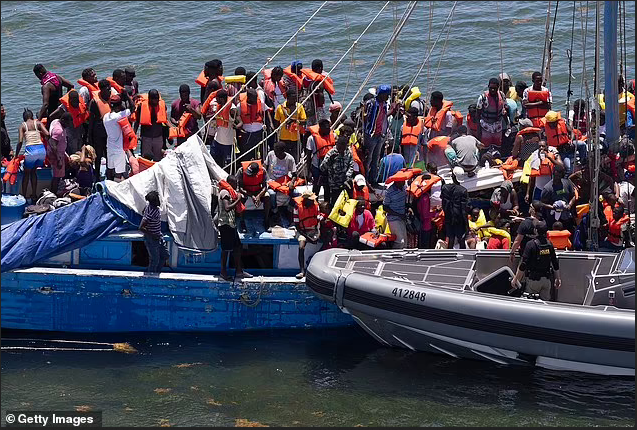 Sixteen Haitian migrants are killed and 21 are rescued after boat capsized off The Bahamas (photos)