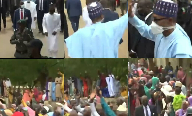 Daura residents file out to greet President Buhari as he treks to his home after observing his Sallah prayers at the Eid ground (video)