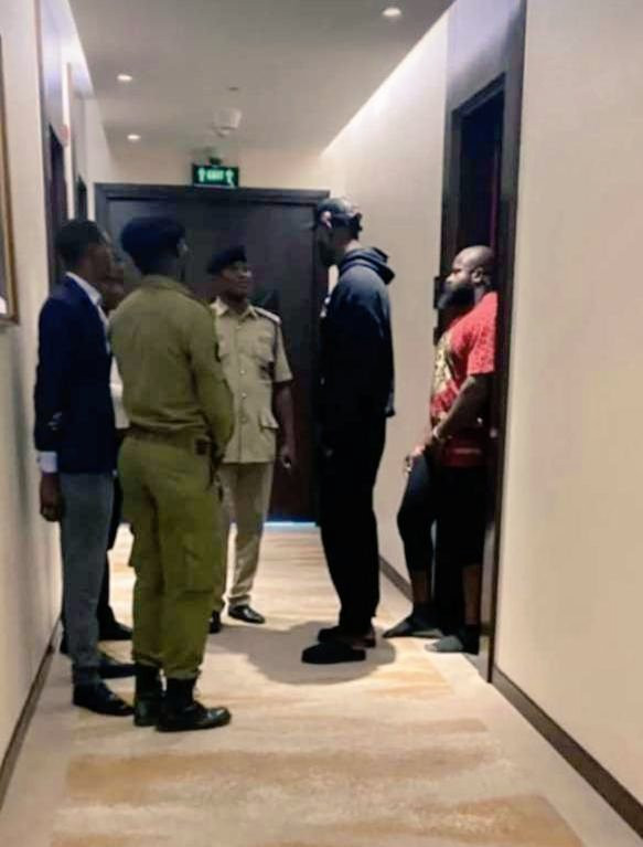 Singer Kizz Daniel arrested in Tanzania for not performing at his concert......watch video of him being escorted by the police 