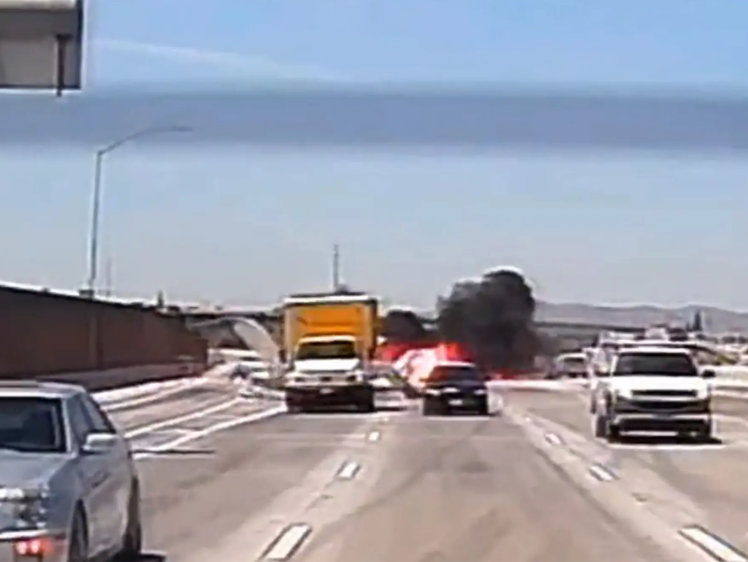 Plane crash lands?on California highway and hits a truck full of people before bursting into flames (video)