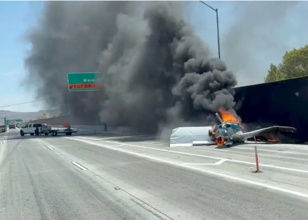Plane crash lands?on California highway and hits a truck full of people before bursting into flames (video)
