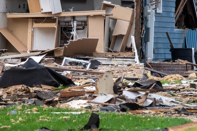 Emergency crews respond to a house explosion in the 1000 block of North Weinbach Avenue in Evansville, Ind., Wednesday afternoon, Aug. 10, 2022.
