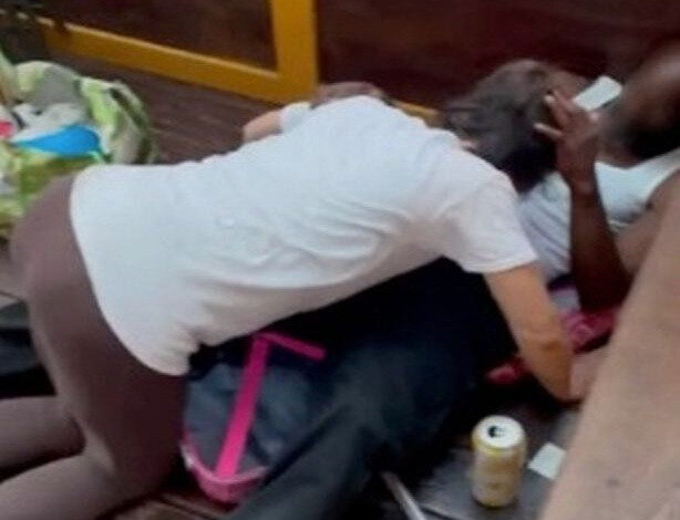 Couple having oral s3x in outdoor dining area caught by worker
