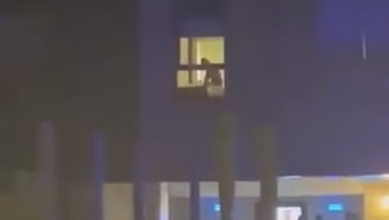 Nigerian couple filmed having s3x in their hotel room as onlookers watch from their window (video)